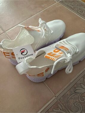 Faywellme White Knit Sneakers with Orange Text Accents